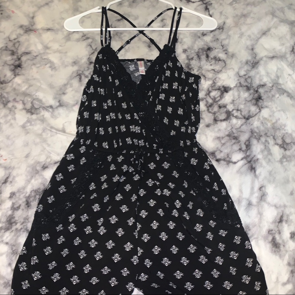 Black romper white designs